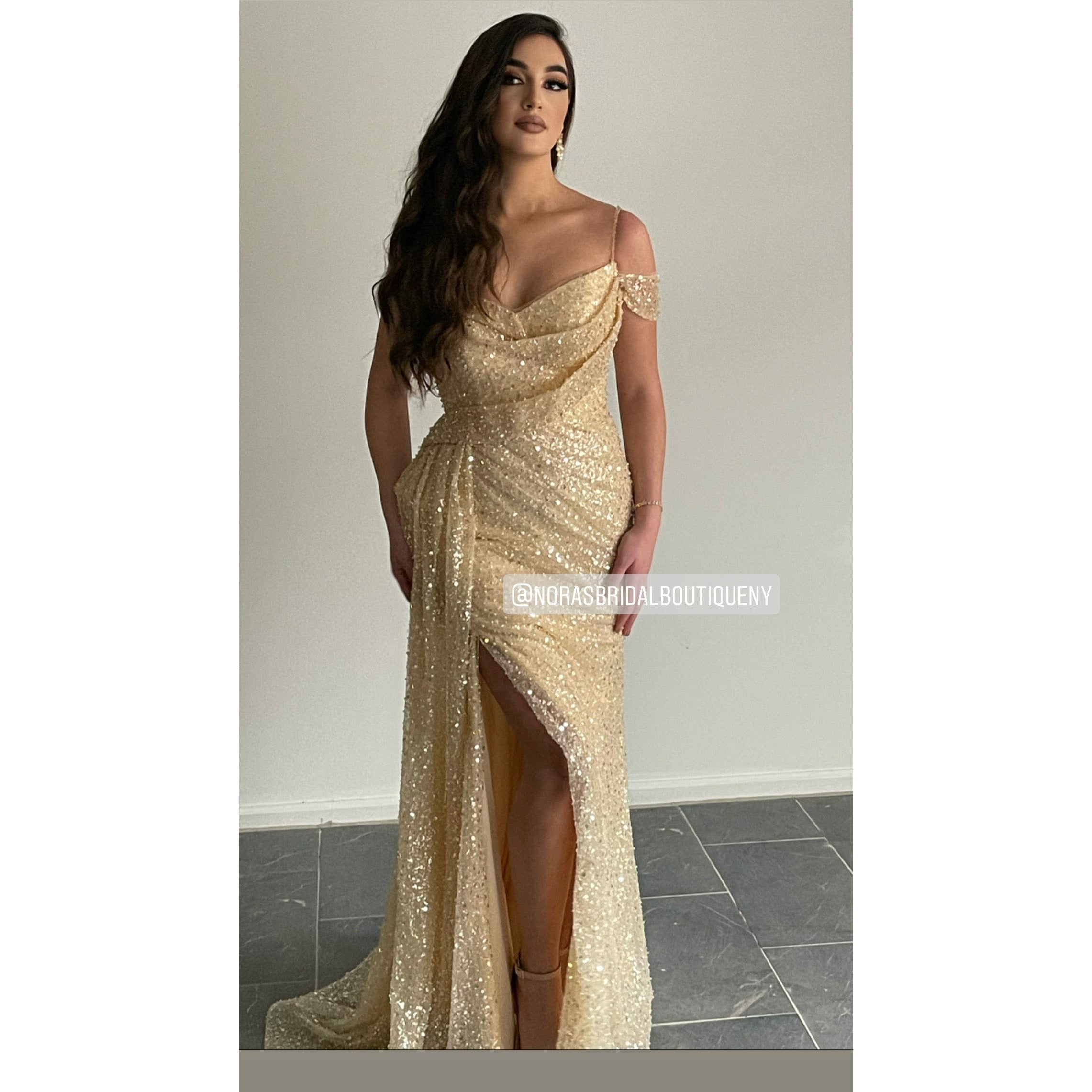NorasBridalBoutiqueNY The Sidorela Couture Gown with stunning beadwork detail and side train